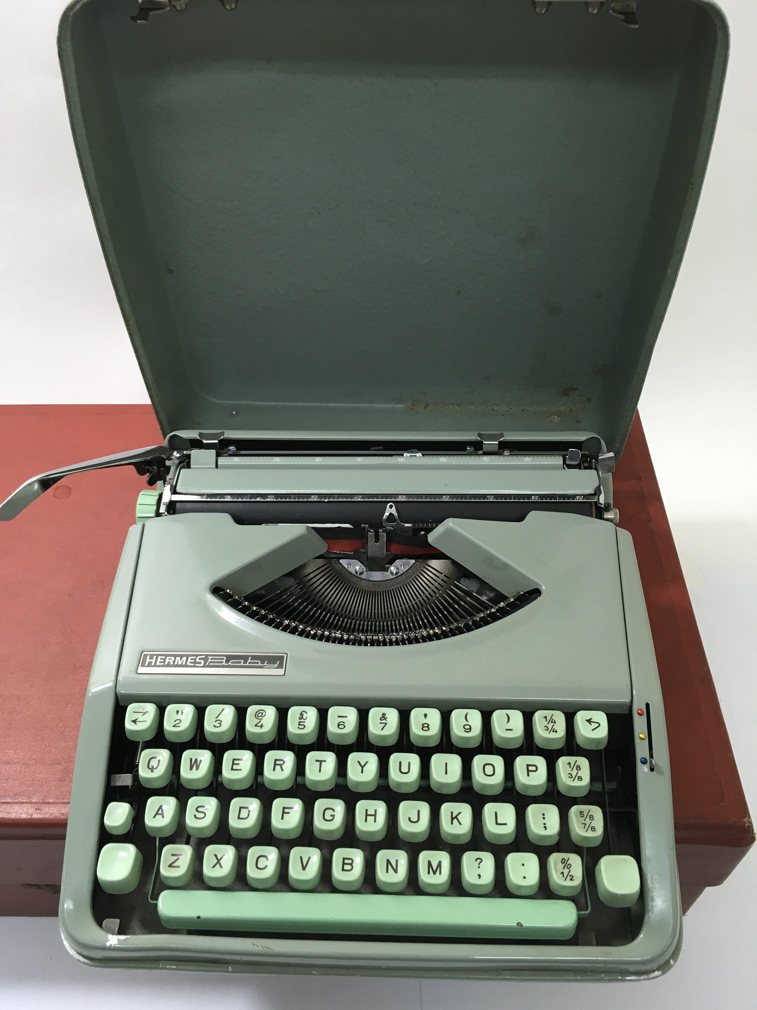 A cased Hermes baby typewriter and a 1950's fitted - Image 2 of 2