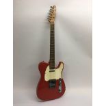 A 1967 Fender Telecaster guitar in red with a whit