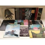 A collection of LPs by various artists including H
