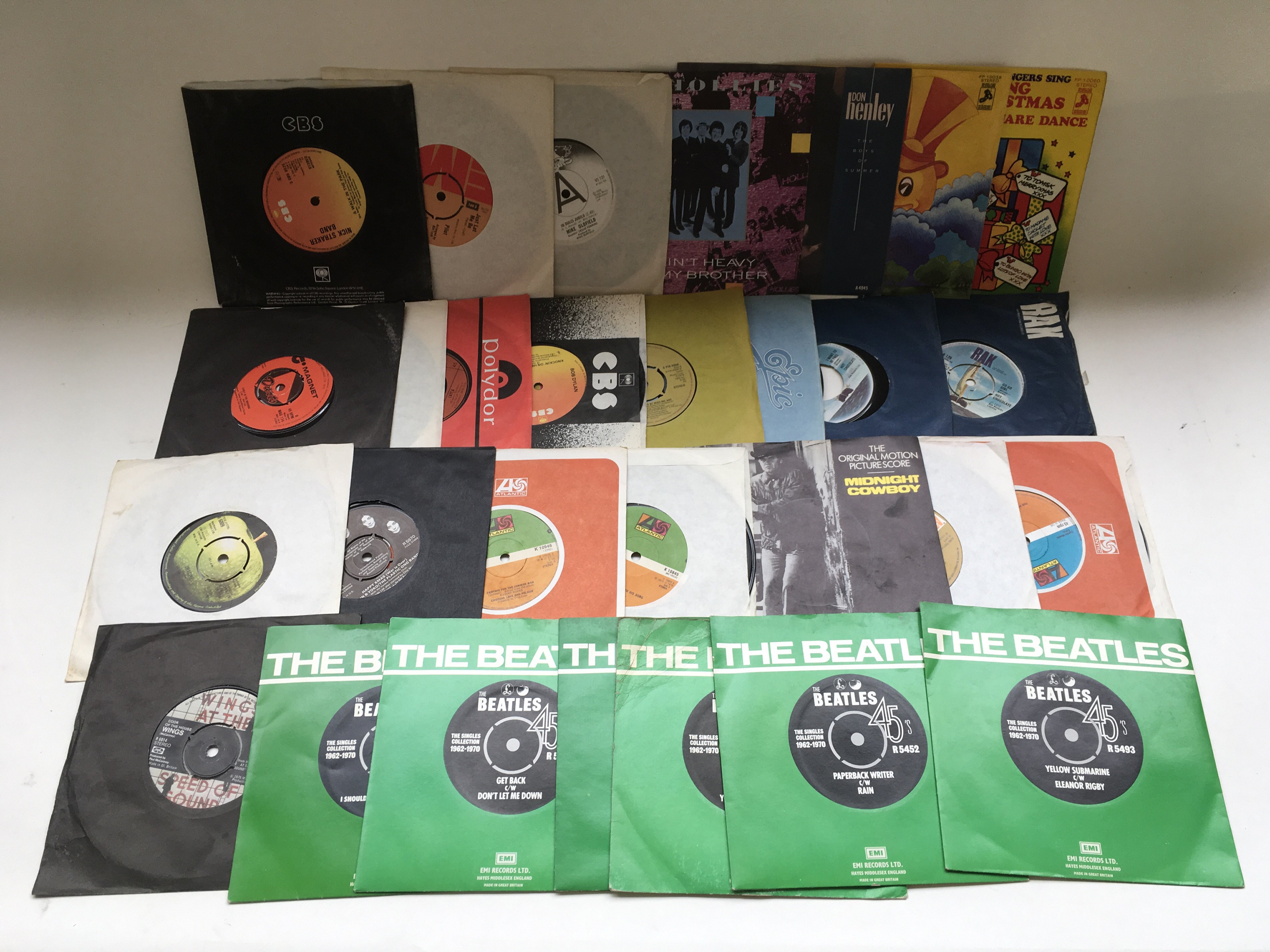 A collection of 7" singles by various artists incl