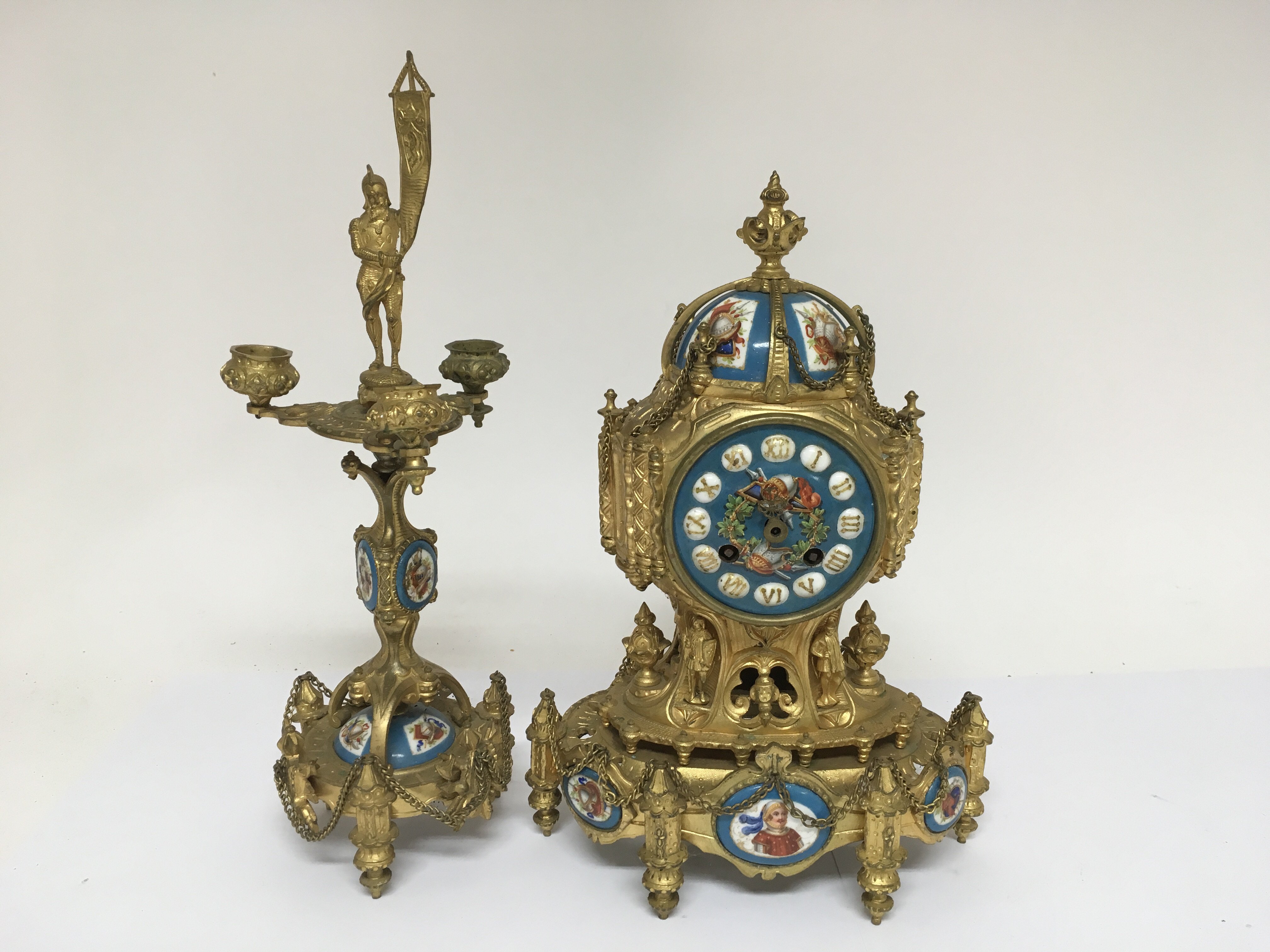 A French enamel mantle clock with a conforming can