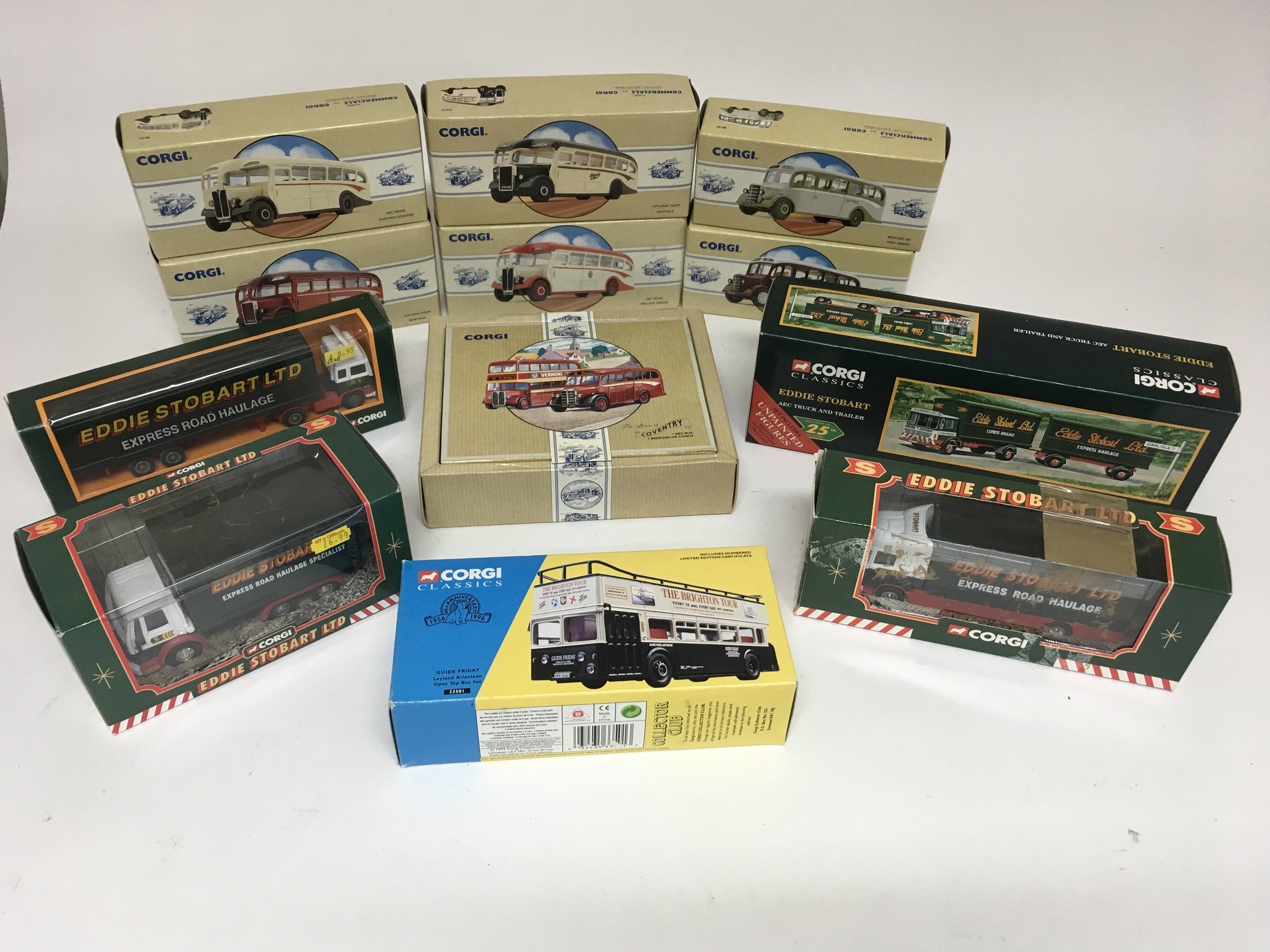 A collection of 4 boxed Eddie Stobart Vehicles tog