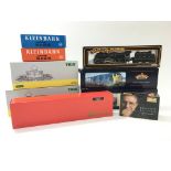 A collection of 9 boxed railway locomotives includ