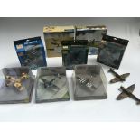 A collection of boxed diecast and plastic WW2aircr