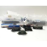 A collection containing unboxed model railway engi