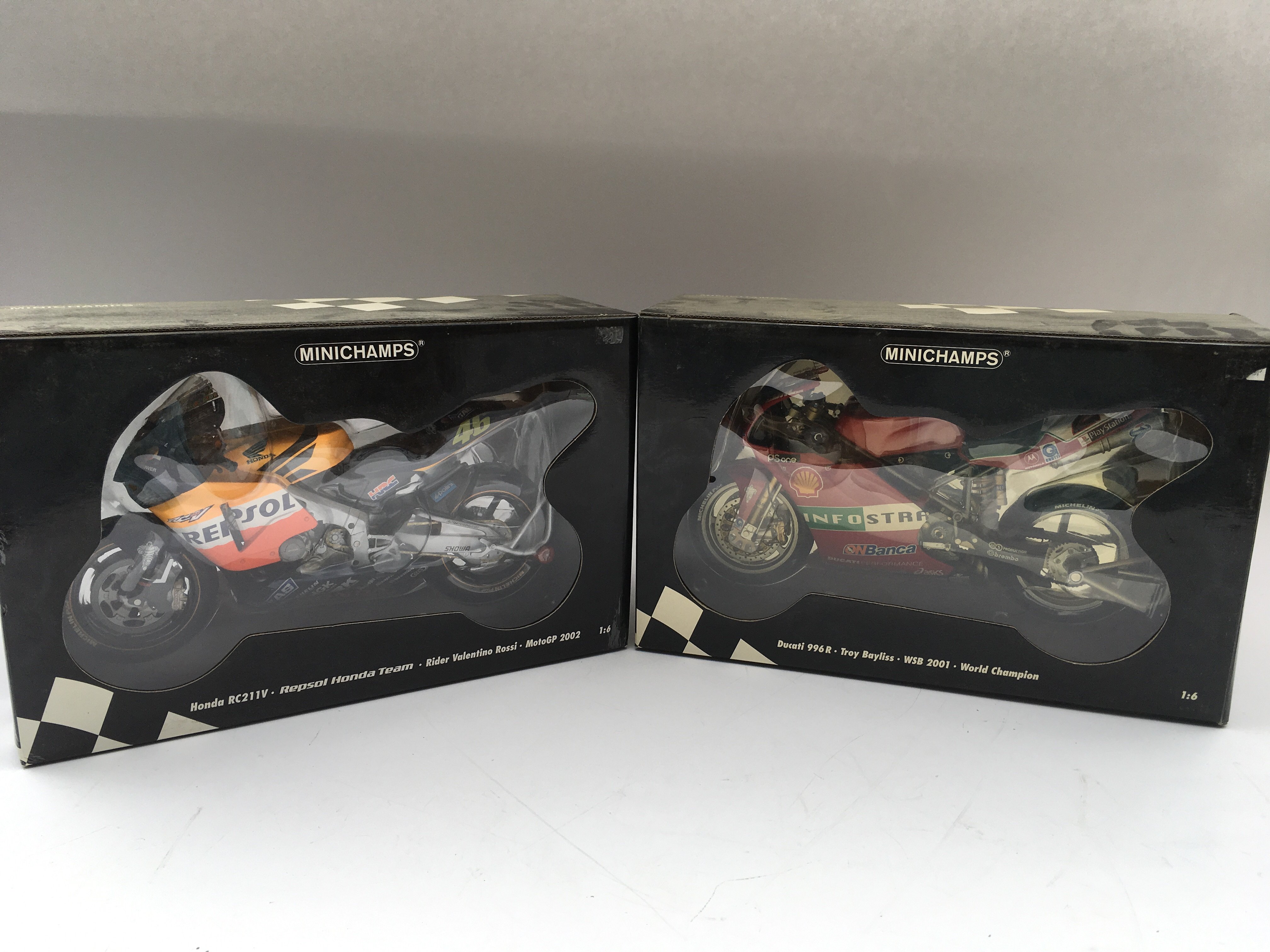 Two large boxed Minichamps motor bikes Ducati 996R