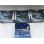 A collection of 4boxed model aircraft including Re