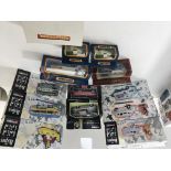 A box containing a collection of boxed model vehicles including Corgi Toys Beatles collection,