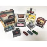 A box containing various boxed model vehicles incl