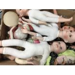 A box of modern dolls