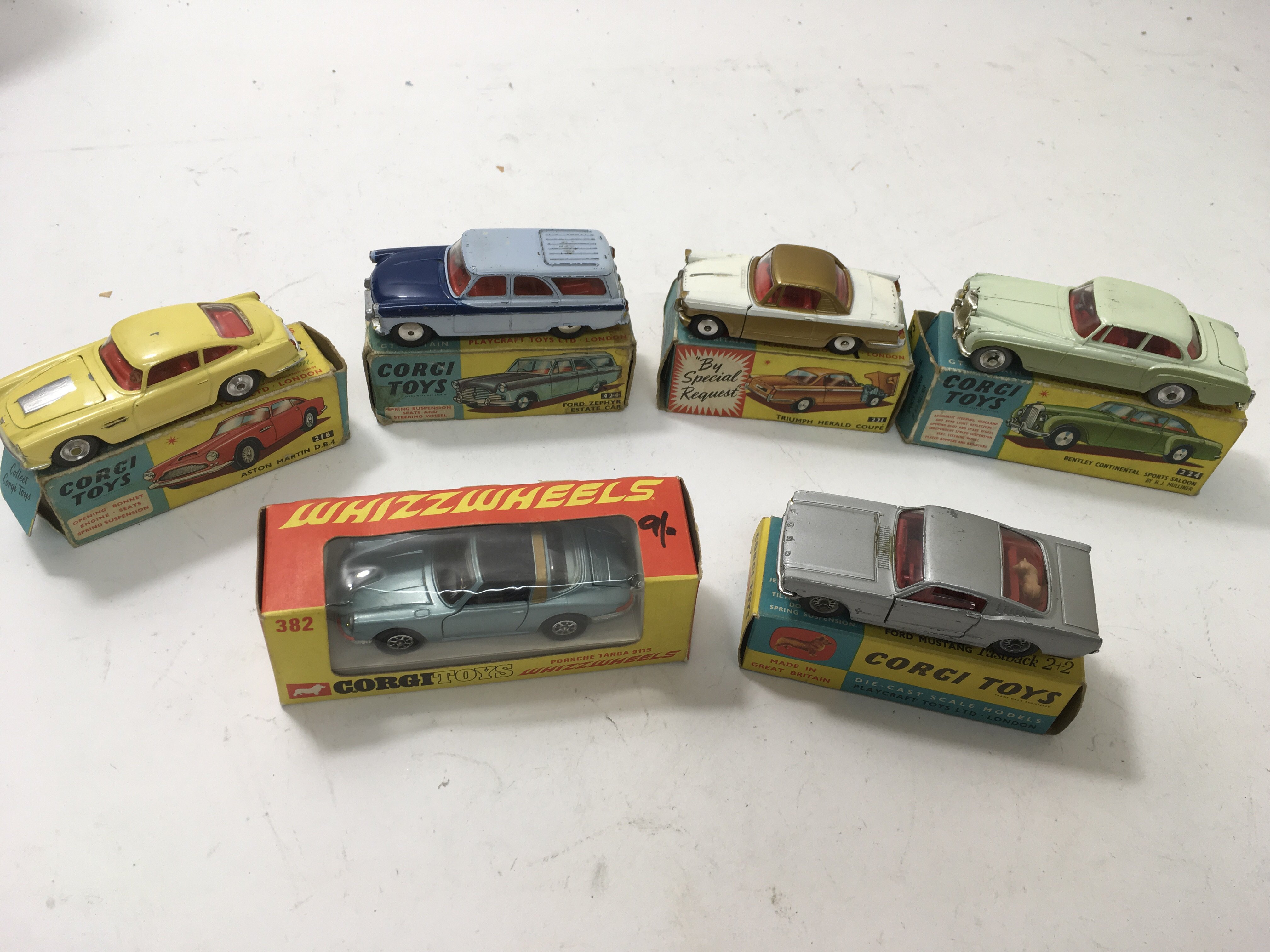 6 boxed Corgi Toys including Triumph Herald No231,