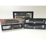 A collection of 5 boxed " Lima " railway locomotiv