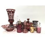 A collection of eleven pieces of red flashed glass