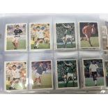 An album containing around 350 football cards and