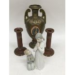 A pair of ceramic candlesticks, a Continental vase