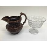 A Victorian brown glazed jug and Victorian golden jubilee bowl.