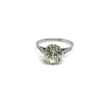 A platinum, 3.2ct diamond old cut solitaire ring f