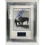 A signed and framed photograph of Jerry Lee Lewis.