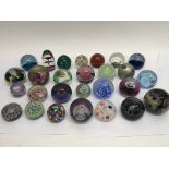 A collection of twenty seven various glass paperwe