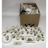 A box of assorted crested china