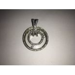 A fine quality, modern design 18ct white gold circ