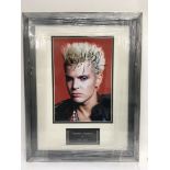 A signed and framed photograph of Billy Idol.