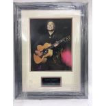 A signed and framed photograph of Marty Wilde.