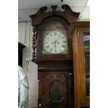 An eight day longcase clock with painted dial depi