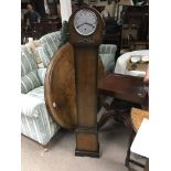 An oak grandmother clock. Height approx 145cm