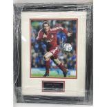 Three framed and mounted colour images of football