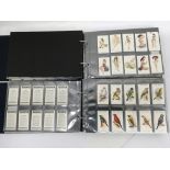 4 albums of cigarette cards including sets depicti