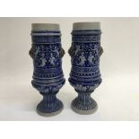 A pair of German stoneware vases.