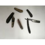 Five old penknives and cutthroat razor