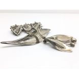 Three silver brooches including two Danish brooche
