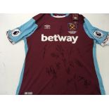 A 2016-17 Weat Ham United football shirt signed by