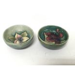 Two petite Moorcroft dishes with typical floral de