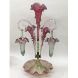 A cranberry epergne approx 54cm in height.