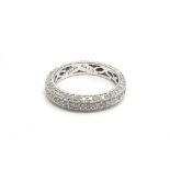 A 9ct white gold ring inset with approximately .75ct diamonds, total weight approximately 2.2 grams,