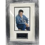 A signed and framed photograph of Chubby Checker.