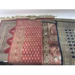 4 Part silk prayer mats,, three red and one blue.