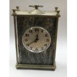 A Vega Russian marble and metal mantle clock, appr