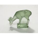 A modern Lalique green glass ornament of a deer, a