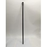 A monogrammed white metal topped walking stick. Le