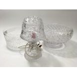 Two large cut glass bowls and a cut glass lamp.