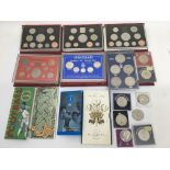 A collection of proof coin sets.