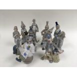 A collection of ten Lladro style clowns.