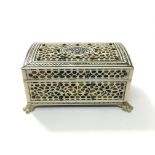 A small bone and tortoiseshell casket, the lid wit