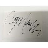 A white card signature of George Michael.