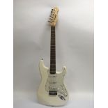 A Stagg Stratocaster style guitar in white with a
