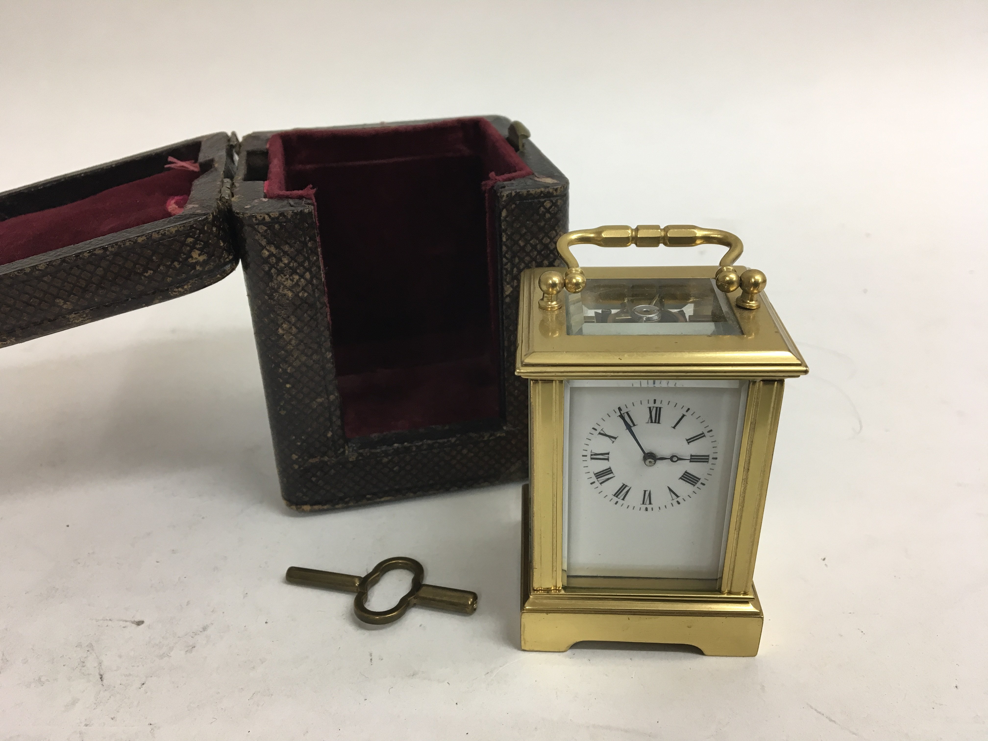 A miniature brass carriage clock. - Image 2 of 4